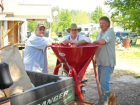 Standing around a seeder